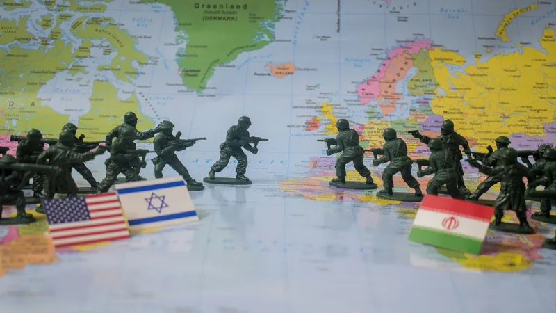 toy soldiers against each other on global map